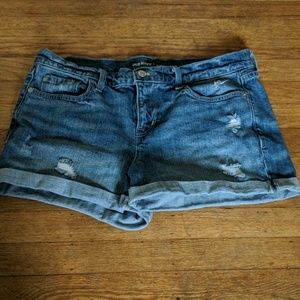 Distressed denim shorts